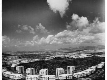 Social Housing Blocks in Upper Nazareth Aerial photograph of rectangular buildings set in landscape.