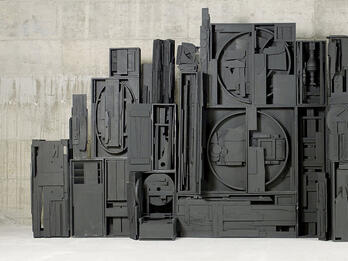 Homage to the Six Million Wooden monument of vertical rectangles and circles.