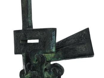 Survivors Are Not Heroes Sculpture with a circle on the bottom and different-sized rectangles extending up and out.