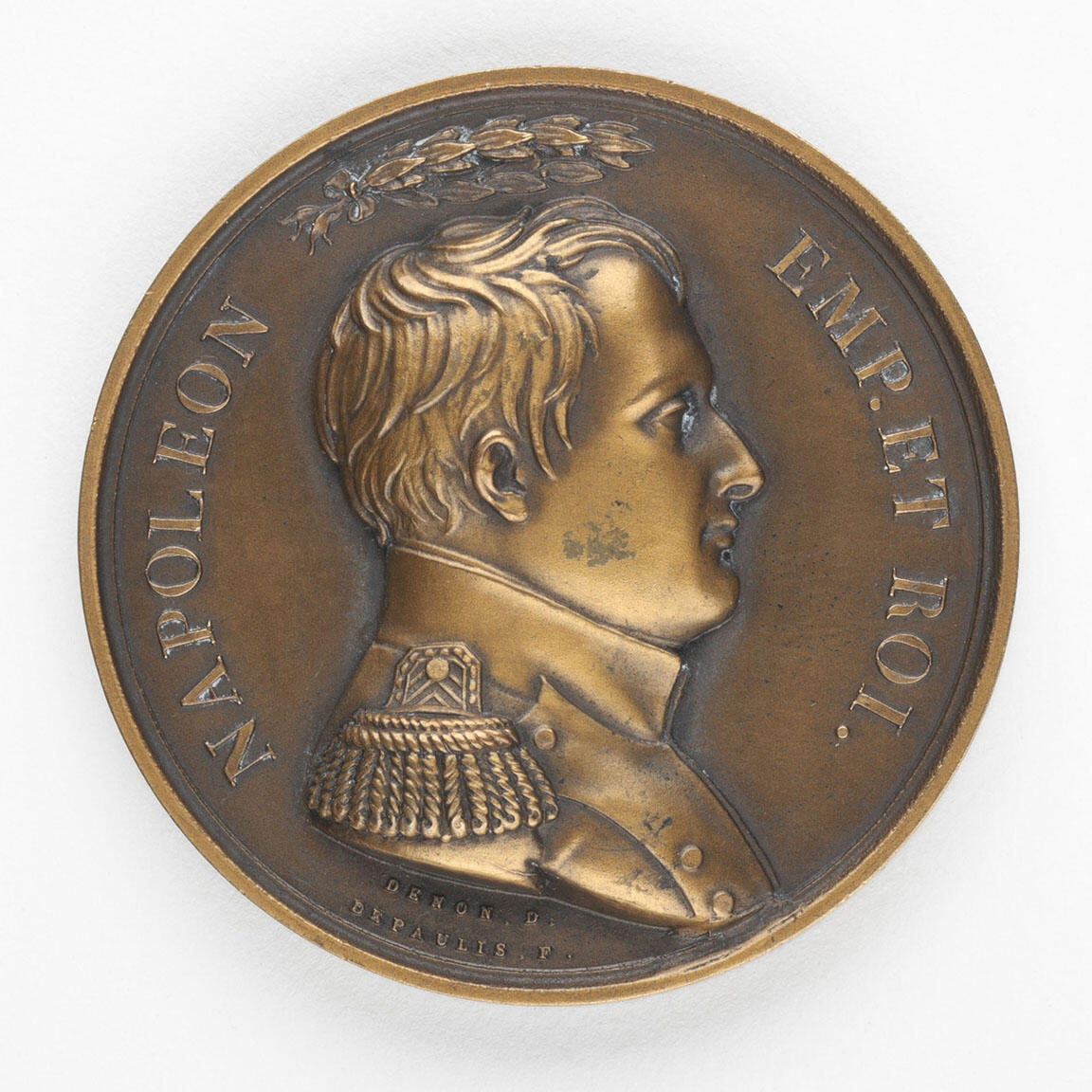 Bronze medal featuring profile of man in epaulets and laurel above head and Latin text.