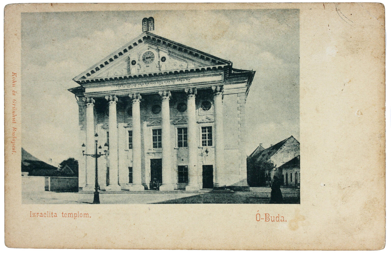 Photograph of building exterior with five columns.