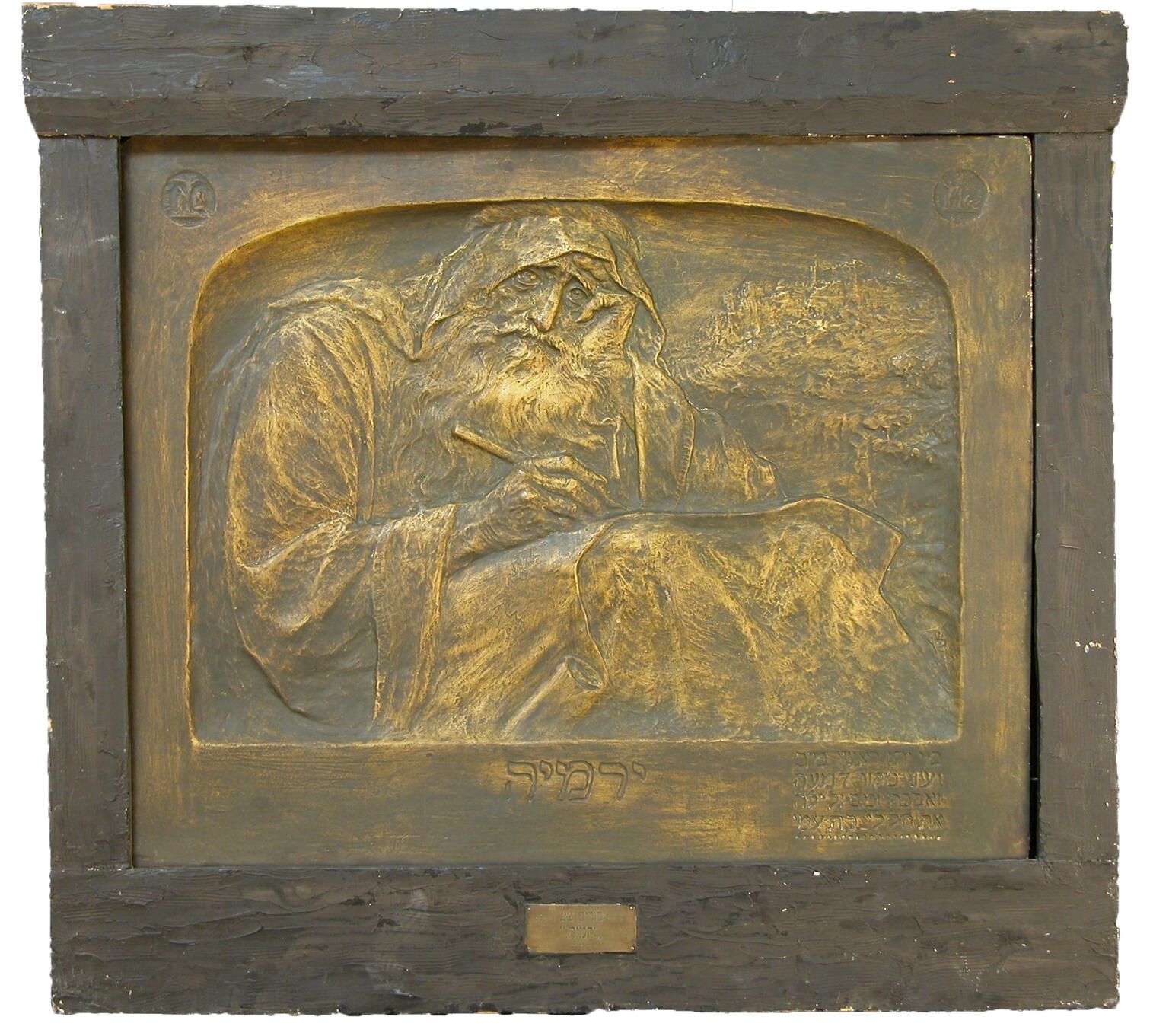 Etching of bearded man looking at viewer with pen in hand and sheet of paper on his lap. Etching of bearded man looking at viewer with pen in hand and sheet of paper on his lap.