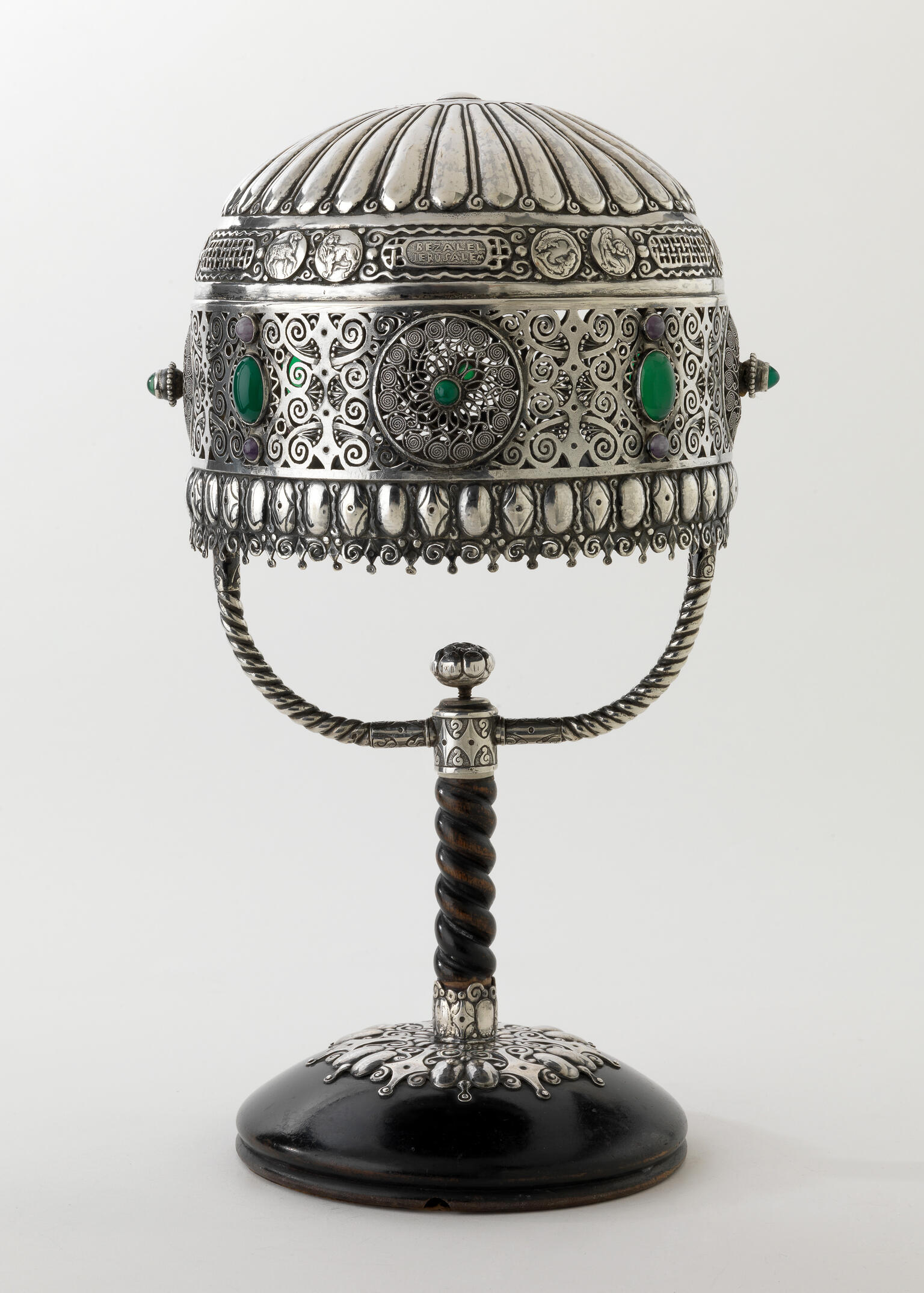 Table lamp with domed silver lampshade with geometric designs. Table lamp with domed silver lampshade with geometric designs.