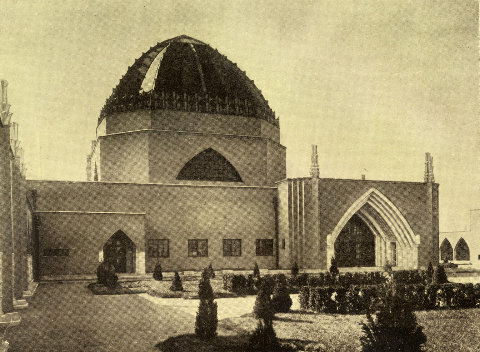Photograph of building with dome roof. Photograph of building with dome roof.