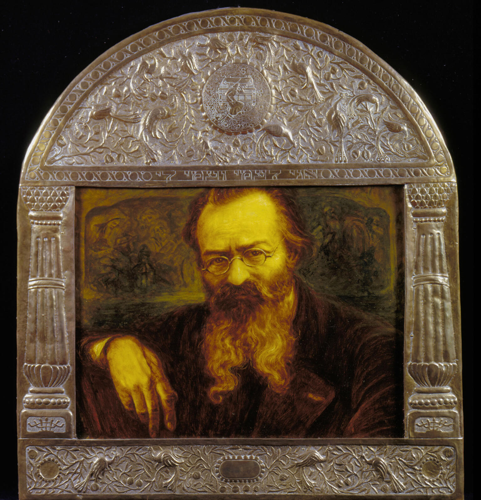 Painting of man in beard and glasses set inside an ornate frame with decorated border. Painting of man in beard and glasses set inside an ornate frame with decorated border.