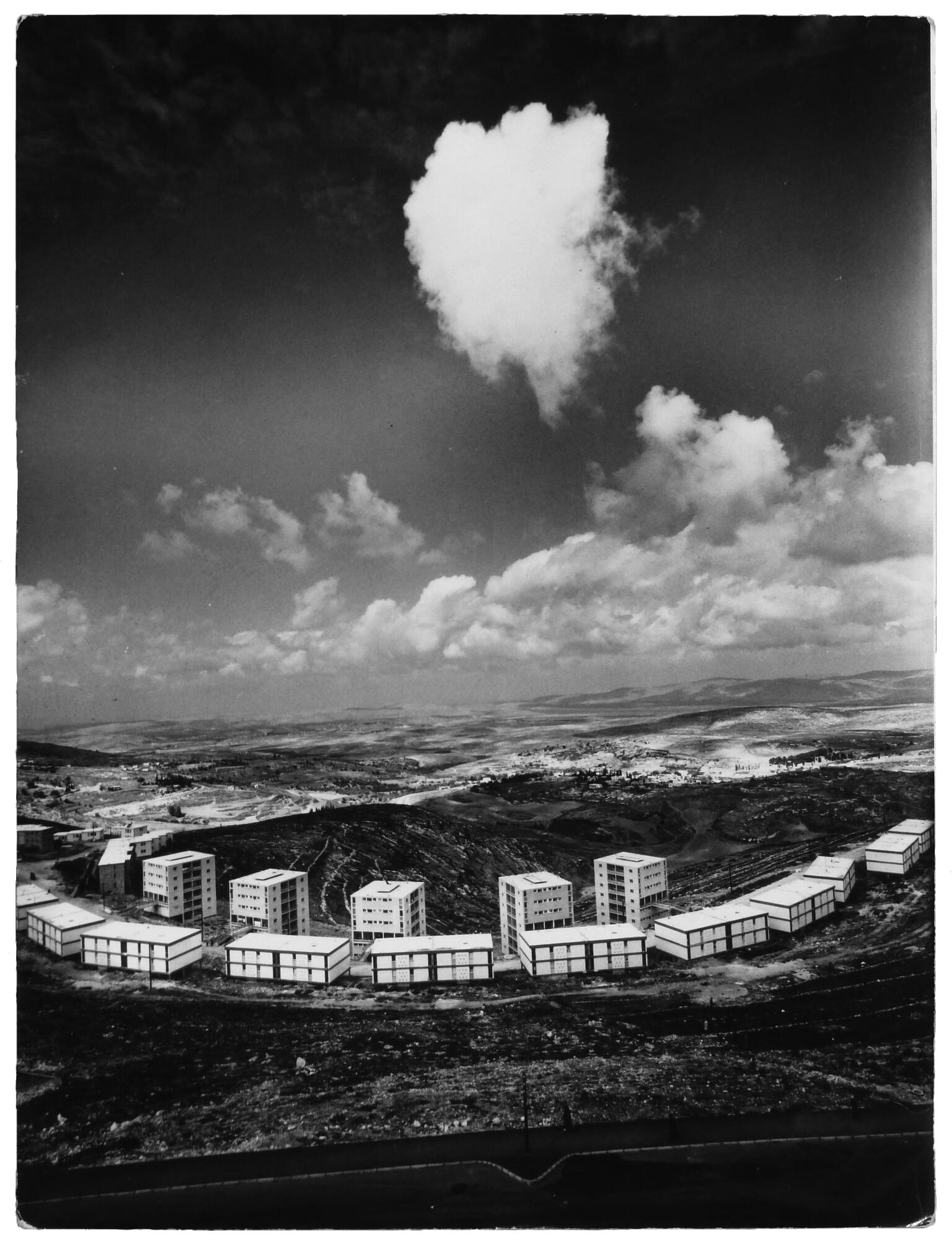 Aerial photograph of rectangular buildings set in landscape. Aerial photograph of rectangular buildings set in landscape.
