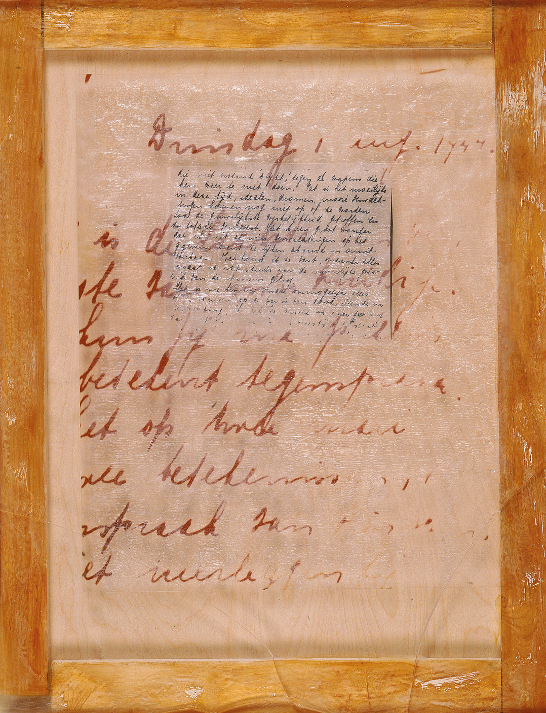 Mixed media featuring page with Dutch writing framed with wood. Mixed media featuring page with Dutch writing framed with wood.