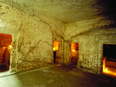 Photograph of room with inner doorways. 
