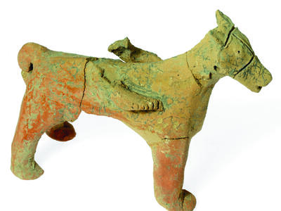 Terra-cotta figurine of horse.