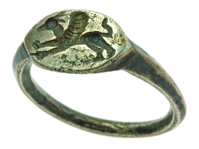 Silver signet ring with image of galloping griffin.