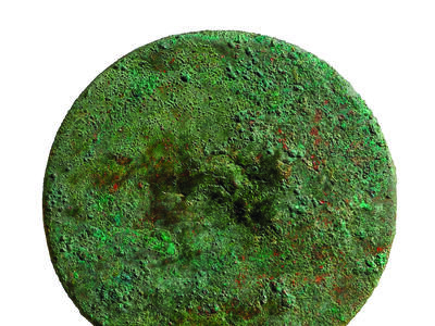 A circular metal disc with small handle.