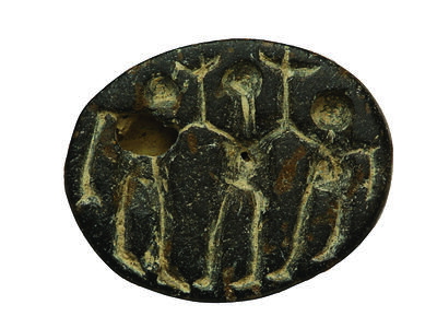 Seal with depiction of three people holding up T-shaped objects.