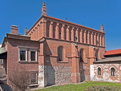 Exterior photograph of brick building of high niches.