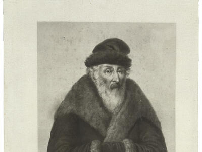 Portrait of bearded man wearing a fur coat.