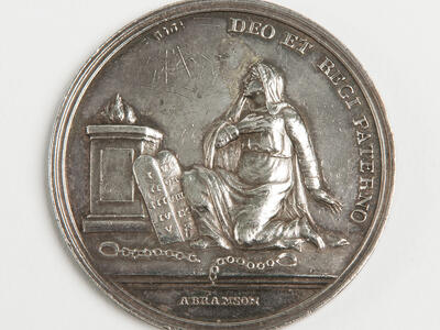 Medal Commemorating the Enfranchisement of the Jews of Westphalia by Jerome Bonaparte Medal featuring seated person next to Hebrew tablets and Latin text around.