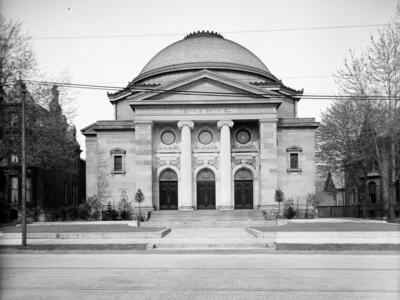 Photograph of exterior of building with domed roof.