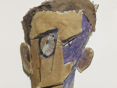 Mask with abstract facial features. 