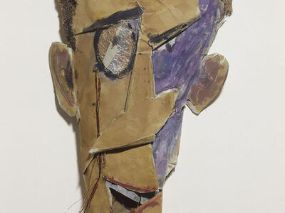 Mask with abstract facial features. 