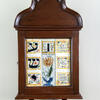 Wood wall piece with bold English letters and flowers. 